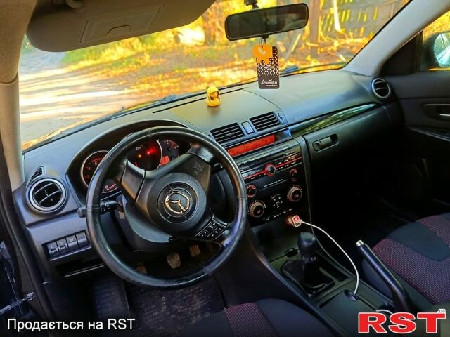 Черный Мазда 3, объемом двигателя 1.6 л и пробегом 124 тыс. км за 2950 $, фото 6 на Automoto.ua