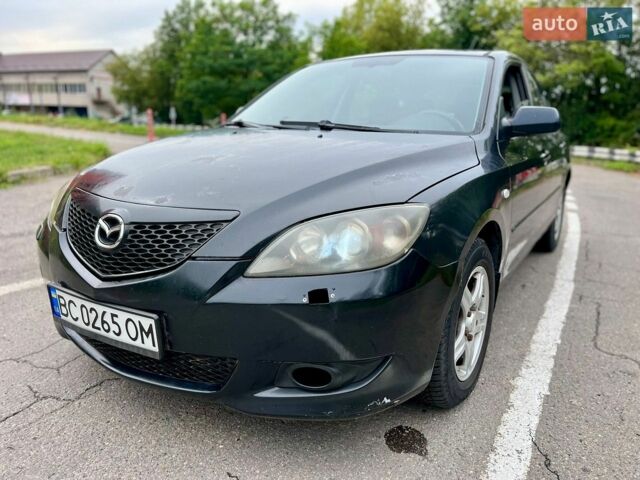 Чорний Мазда 3, об'ємом двигуна 1.6 л та пробігом 260 тис. км за 2499 $, фото 12 на Automoto.ua