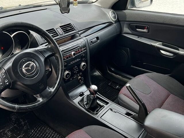Чорний Мазда 3, об'ємом двигуна 1.56 л та пробігом 324 тис. км за 2650 $, фото 8 на Automoto.ua