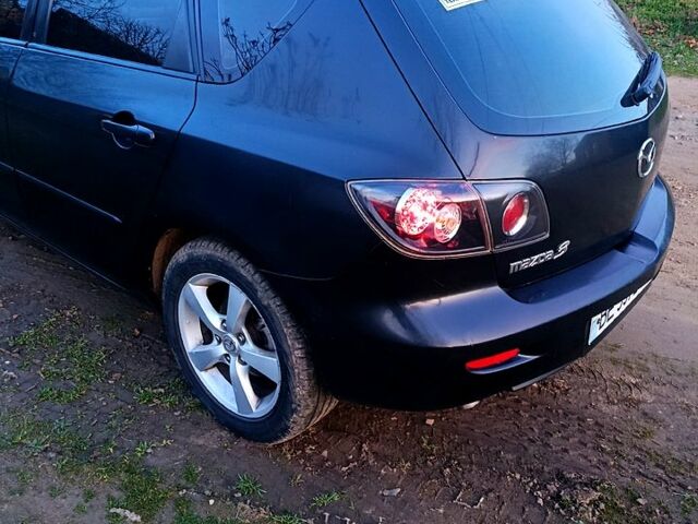 Чорний Мазда 3, об'ємом двигуна 1.6 л та пробігом 376 тис. км за 4400 $, фото 5 на Automoto.ua