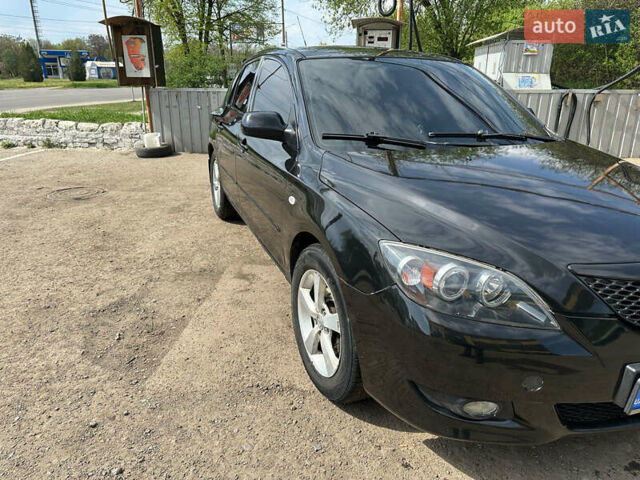 Черный Мазда 3, объемом двигателя 1.6 л и пробегом 240 тыс. км за 3400 $, фото 3 на Automoto.ua