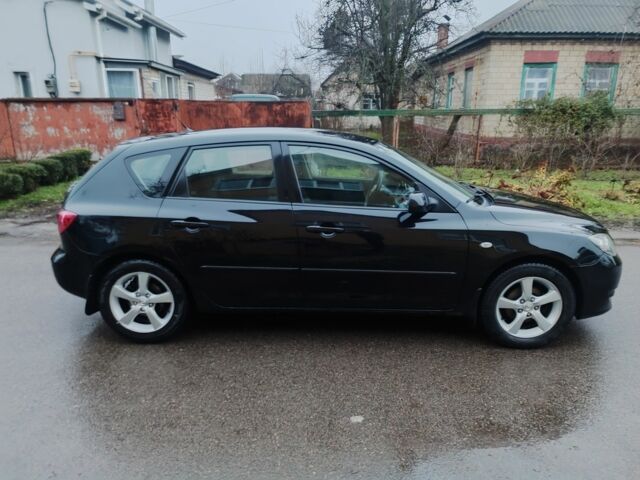 Чорний Мазда 3, об'ємом двигуна 1.6 л та пробігом 242 тис. км за 4250 $, фото 5 на Automoto.ua