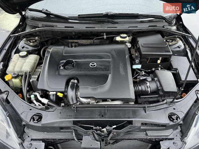 Черный Мазда 3, объемом двигателя 1.6 л и пробегом 349 тыс. км за 4499 $, фото 11 на Automoto.ua