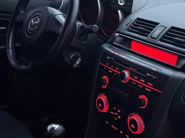 Черный Мазда 3, объемом двигателя 1.6 л и пробегом 300 тыс. км за 4000 $, фото 6 на Automoto.ua