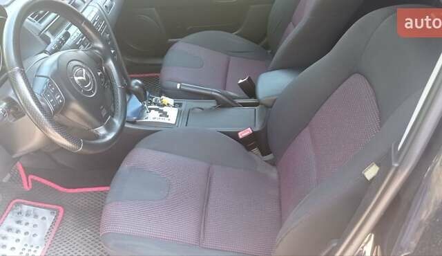 Черный Мазда 3, объемом двигателя 1.6 л и пробегом 322 тыс. км за 4700 $, фото 14 на Automoto.ua