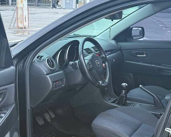 Черный Мазда 3, объемом двигателя 0 л и пробегом 200 тыс. км за 4500 $, фото 6 на Automoto.ua
