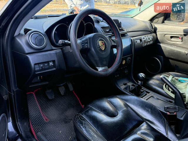 Чорний Мазда 3, об'ємом двигуна 2 л та пробігом 173 тис. км за 2999 $, фото 4 на Automoto.ua