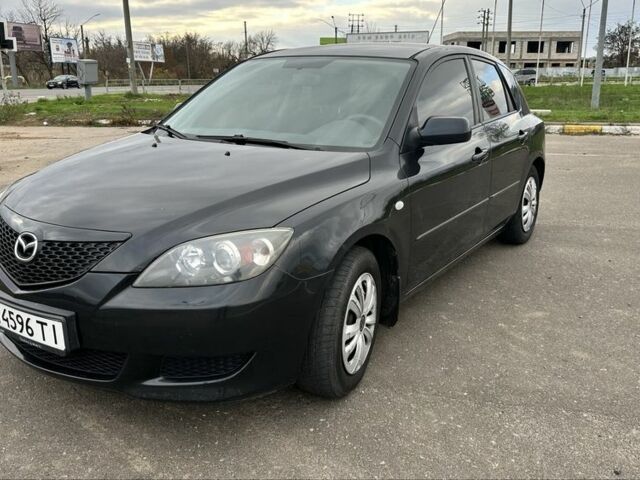 Черный Мазда 3, объемом двигателя 1.3 л и пробегом 190 тыс. км за 3200 $, фото 1 на Automoto.ua