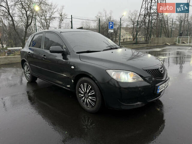 Черный Мазда 3, объемом двигателя 1.6 л и пробегом 349 тыс. км за 4499 $, фото 1 на Automoto.ua