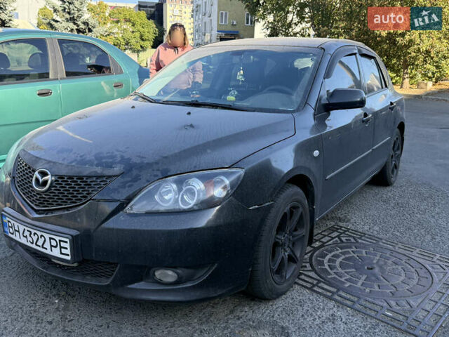 Чорний Мазда 3, об'ємом двигуна 2 л та пробігом 173 тис. км за 2999 $, фото 1 на Automoto.ua