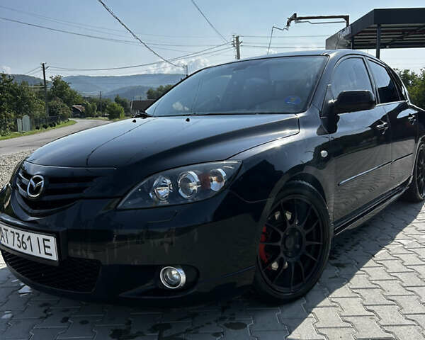 Черный Мазда 3, объемом двигателя 2 л и пробегом 235 тыс. км за 5500 $, фото 6 на Automoto.ua