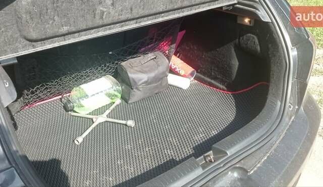 Черный Мазда 3, объемом двигателя 1.6 л и пробегом 322 тыс. км за 4700 $, фото 13 на Automoto.ua