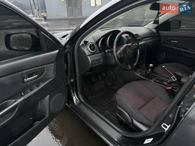 Черный Мазда 3, объемом двигателя 1.6 л и пробегом 349 тыс. км за 4499 $, фото 6 на Automoto.ua