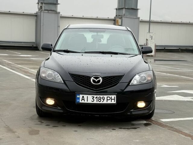 Черный Мазда 3, объемом двигателя 1.6 л и пробегом 300 тыс. км за 4000 $, фото 1 на Automoto.ua