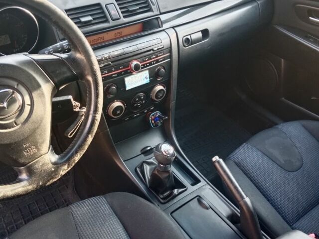 Черный Мазда 3, объемом двигателя 1.6 л и пробегом 270 тыс. км за 3600 $, фото 2 на Automoto.ua