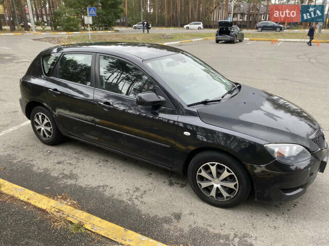 Черный Мазда 3, объемом двигателя 1.6 л и пробегом 347 тыс. км за 3500 $, фото 1 на Automoto.ua