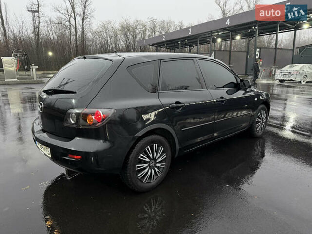 Черный Мазда 3, объемом двигателя 1.6 л и пробегом 349 тыс. км за 4499 $, фото 2 на Automoto.ua