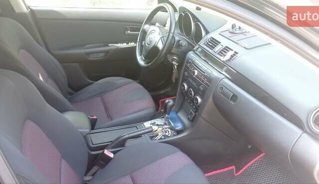 Черный Мазда 3, объемом двигателя 1.6 л и пробегом 322 тыс. км за 4700 $, фото 10 на Automoto.ua