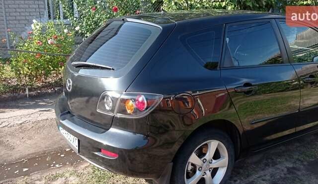 Черный Мазда 3, объемом двигателя 1.6 л и пробегом 322 тыс. км за 4700 $, фото 2 на Automoto.ua