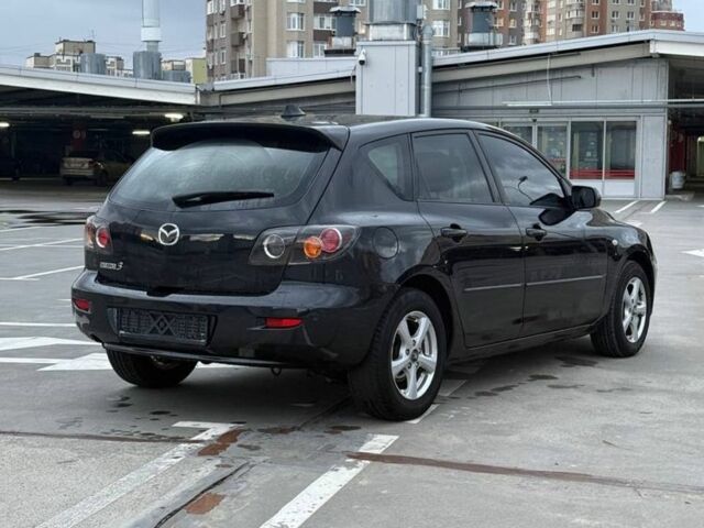 Черный Мазда 3, объемом двигателя 0 л и пробегом 300 тыс. км за 4500 $, фото 3 на Automoto.ua