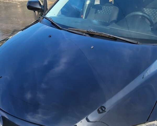 Черный Мазда 3, объемом двигателя 2 л и пробегом 193 тыс. км за 6000 $, фото 4 на Automoto.ua