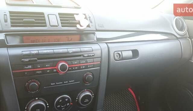 Черный Мазда 3, объемом двигателя 1.6 л и пробегом 322 тыс. км за 4700 $, фото 15 на Automoto.ua