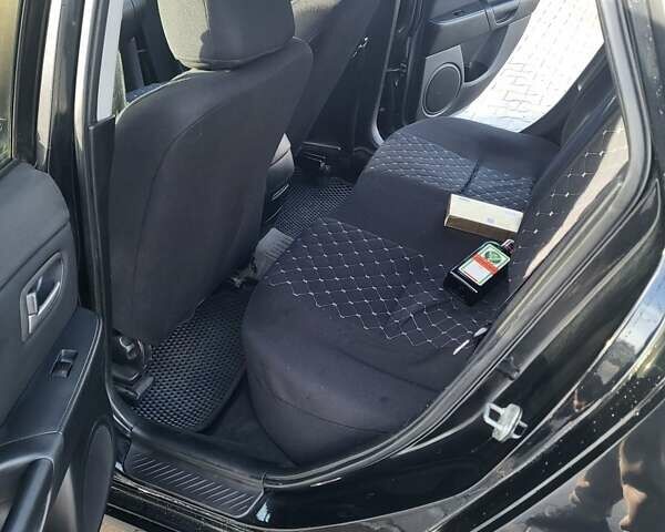 Черный Мазда 3, объемом двигателя 2 л и пробегом 193 тыс. км за 6000 $, фото 10 на Automoto.ua