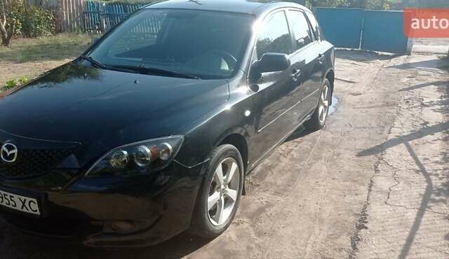 Черный Мазда 3, объемом двигателя 1.6 л и пробегом 322 тыс. км за 4700 $, фото 4 на Automoto.ua