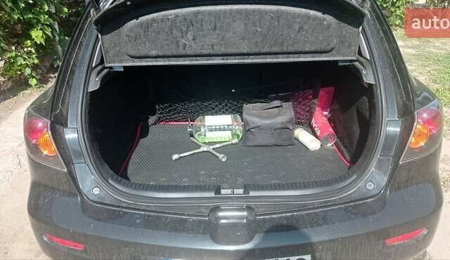 Черный Мазда 3, объемом двигателя 1.6 л и пробегом 322 тыс. км за 4700 $, фото 12 на Automoto.ua