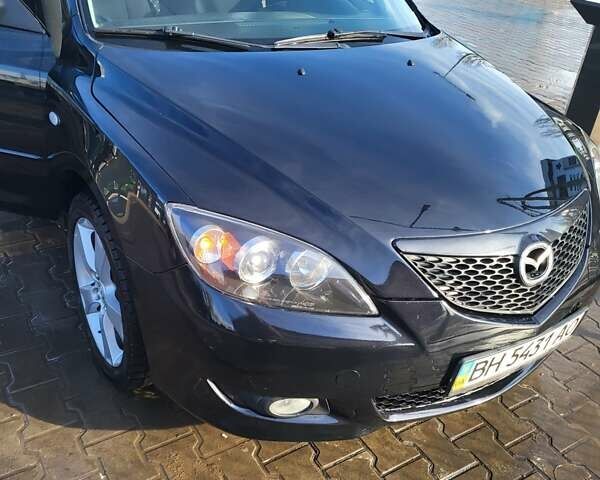 Черный Мазда 3, объемом двигателя 2 л и пробегом 193 тыс. км за 6000 $, фото 2 на Automoto.ua