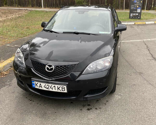 Черный Мазда 3, объемом двигателя 1.6 л и пробегом 347 тыс. км за 3500 $, фото 6 на Automoto.ua