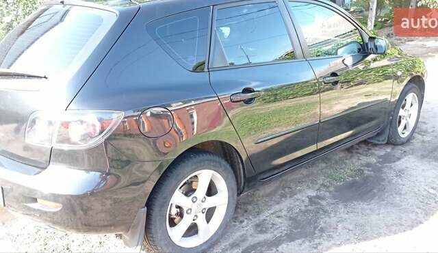 Черный Мазда 3, объемом двигателя 1.6 л и пробегом 322 тыс. км за 4700 $, фото 1 на Automoto.ua