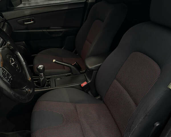 Черный Мазда 3, объемом двигателя 1.6 л и пробегом 349 тыс. км за 4499 $, фото 7 на Automoto.ua