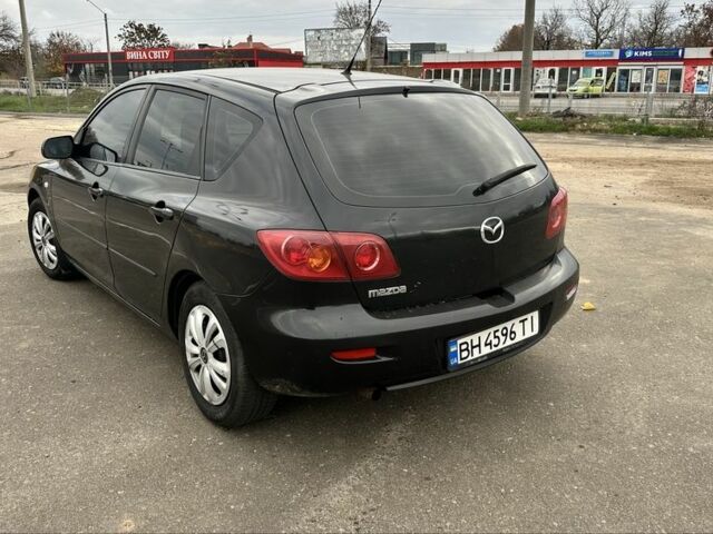 Черный Мазда 3, объемом двигателя 1.3 л и пробегом 190 тыс. км за 3200 $, фото 2 на Automoto.ua