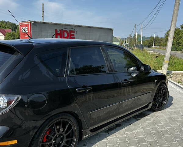 Черный Мазда 3, объемом двигателя 2 л и пробегом 235 тыс. км за 5500 $, фото 4 на Automoto.ua