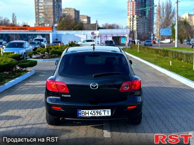 Черный Мазда 3, объемом двигателя 1.3 л и пробегом 200 тыс. км за 3799 $, фото 6 на Automoto.ua