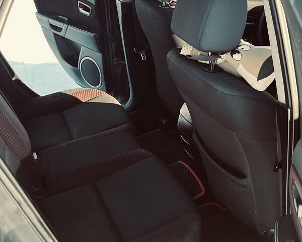 Чорний Мазда 3, об'ємом двигуна 2 л та пробігом 372 тис. км за 3900 $, фото 3 на Automoto.ua
