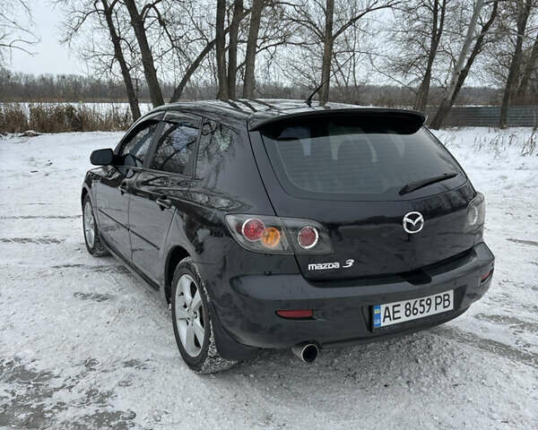 Чорний Мазда 3, об'ємом двигуна 1.6 л та пробігом 205 тис. км за 5199 $, фото 5 на Automoto.ua