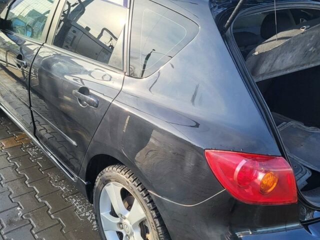 Черный Мазда 3, объемом двигателя 2 л и пробегом 193 тыс. км за 6000 $, фото 9 на Automoto.ua