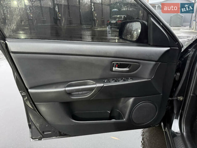 Черный Мазда 3, объемом двигателя 1.6 л и пробегом 349 тыс. км за 4499 $, фото 9 на Automoto.ua