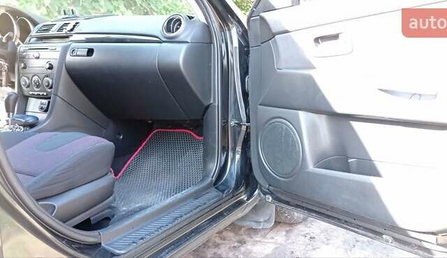 Черный Мазда 3, объемом двигателя 1.6 л и пробегом 322 тыс. км за 4700 $, фото 7 на Automoto.ua