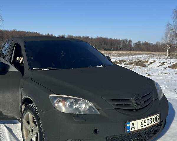 Чорний Мазда 3, об'ємом двигуна 2 л та пробігом 372 тис. км за 3900 $, фото 2 на Automoto.ua