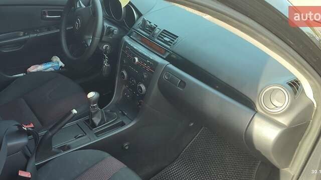 Чорний Мазда 3, об'ємом двигуна 1.6 л та пробігом 316 тис. км за 4300 $, фото 4 на Automoto.ua