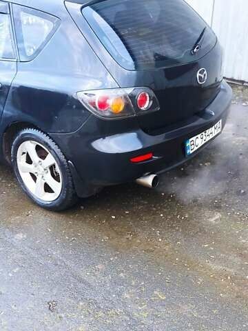 Черный Мазда 3, объемом двигателя 1.6 л и пробегом 260 тыс. км за 2800 $, фото 1 на Automoto.ua