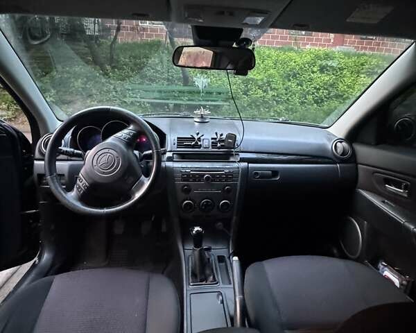 Чорний Мазда 3, об'ємом двигуна 2 л та пробігом 340 тис. км за 5000 $, фото 8 на Automoto.ua
