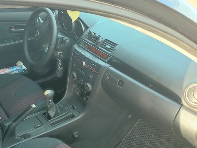 Черный Мазда 3, объемом двигателя 1.6 л и пробегом 316 тыс. км за 4300 $, фото 4 на Automoto.ua