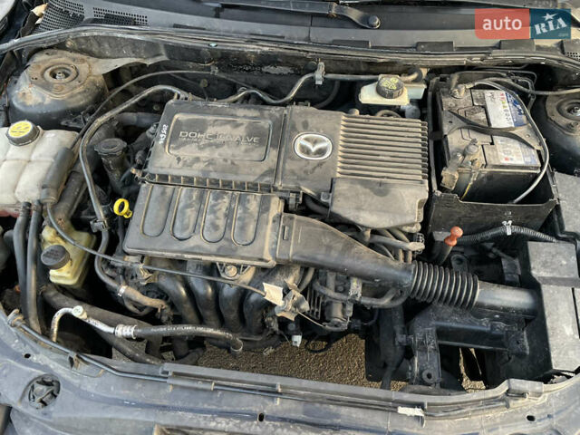 Черный Мазда 3, объемом двигателя 1.6 л и пробегом 360 тыс. км за 4600 $, фото 26 на Automoto.ua