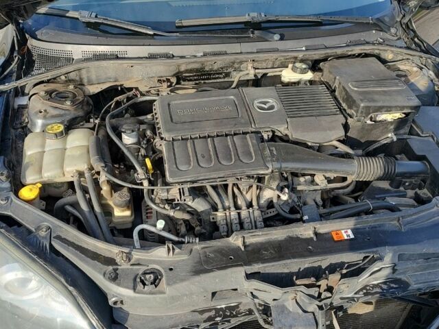 Чорний Мазда 3, об'ємом двигуна 1.6 л та пробігом 330 тис. км за 4500 $, фото 7 на Automoto.ua