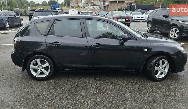 Чорний Мазда 3, об'ємом двигуна 1.6 л та пробігом 141 тис. км за 3900 $, фото 6 на Automoto.ua
