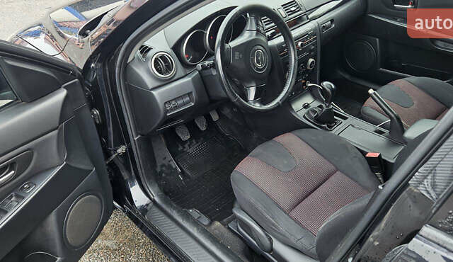 Чорний Мазда 3, об'ємом двигуна 1.6 л та пробігом 141 тис. км за 3900 $, фото 10 на Automoto.ua